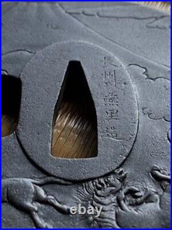 Japanese antique iron the famous Choshu Tsuba. Signed. Fuji and horse design